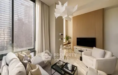 Modern living room with stylish furniture and large windows offering city views.