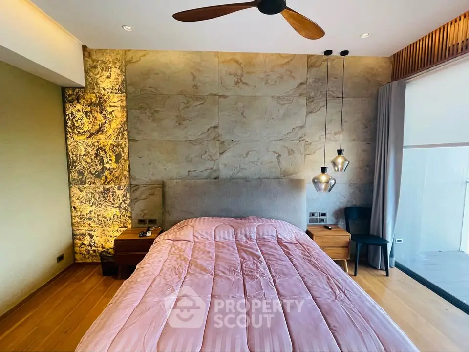 Luxurious bedroom with elegant decor and modern lighting