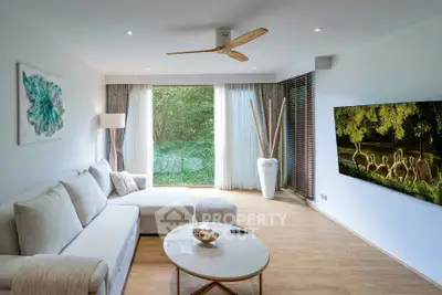 Modern living room with large window and stylish decor