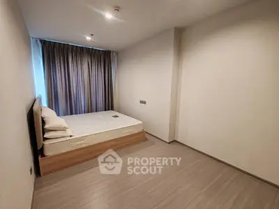 Spacious minimalist bedroom with modern design and natural light