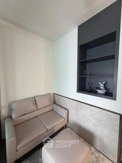 Cozy living room with modern decor and built-in shelving