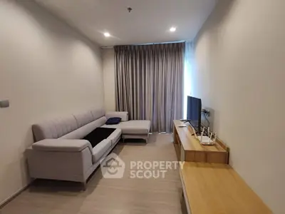 Modern living room with sleek furniture and natural light