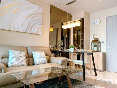 Modern living room with elegant decor and dining area, featuring stylish furniture and ambient lighting.