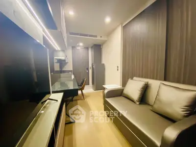 Modern living room with sleek design and cozy sofa in a stylish apartment.