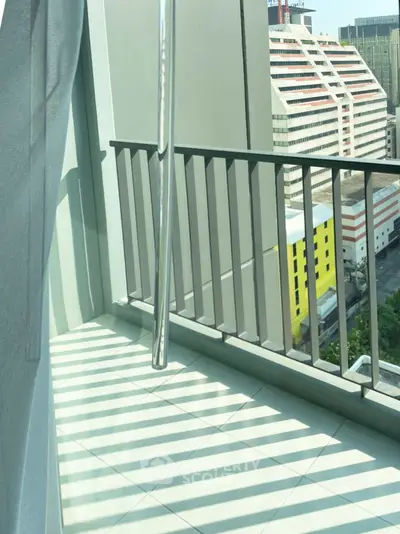 Modern balcony with city view and sleek railing design