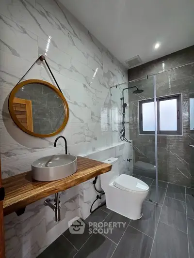 Modern bathroom with stylish fixtures and elegant tile design