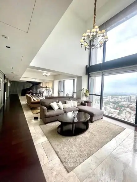 Luxurious living room with panoramic city views and elegant decor