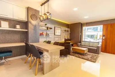 Modern living room with stylish decor and ample natural light