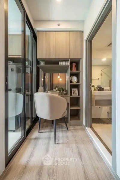 Modern study nook with sleek design and ample storage in a contemporary apartment.