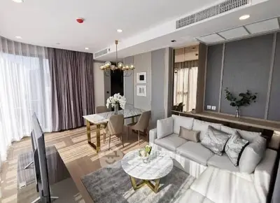 Luxurious modern living room with elegant decor and ample natural light