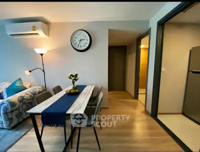 Modern living room with stylish dining area and cozy ambiance