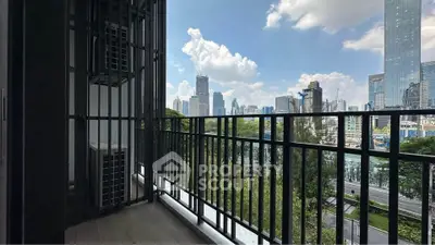 Spacious balcony with stunning city skyline view, perfect for urban living.