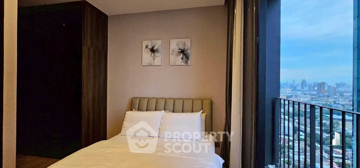 Modern bedroom with city view and stylish decor in high-rise apartment