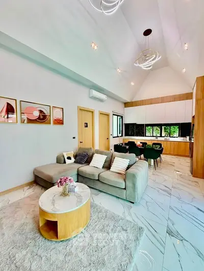 Spacious modern living room with high ceilings and elegant decor