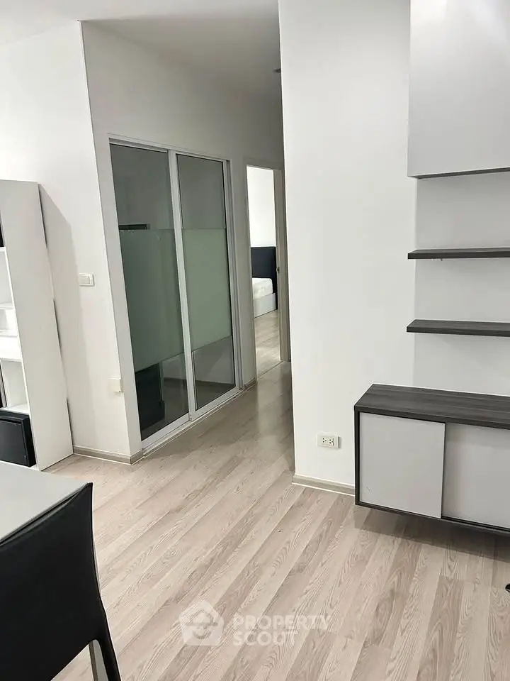 Modern apartment interior with sleek design and wooden flooring