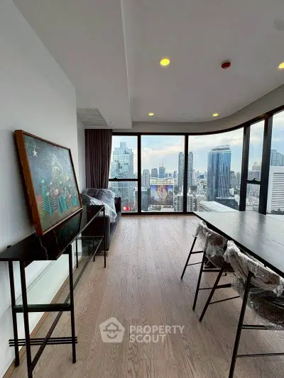 Stunning high-rise apartment with panoramic city views and modern interior design.