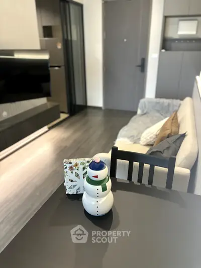 Modern living room with sleek furniture and cozy decor