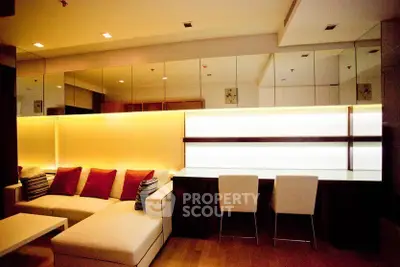 Modern living room with stylish lighting and comfortable seating