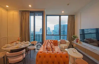 Luxurious living room with stunning city view, elegant furniture, and floor-to-ceiling windows.