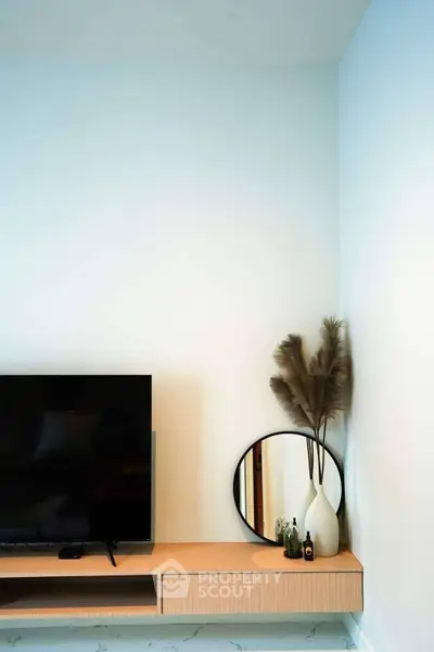 Modern living room with sleek TV unit and stylish decor