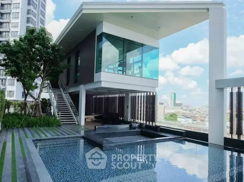 Luxurious rooftop pool with modern architecture and stunning city views.