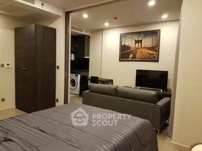 Modern studio apartment with stylish decor and in-unit laundry