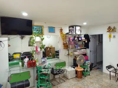Cozy interior space with modern decor and seating area, ideal for small gatherings or relaxation.