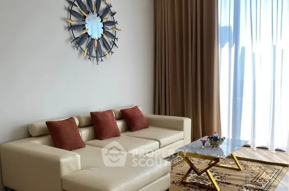 Elegant living room with modern decor and natural light