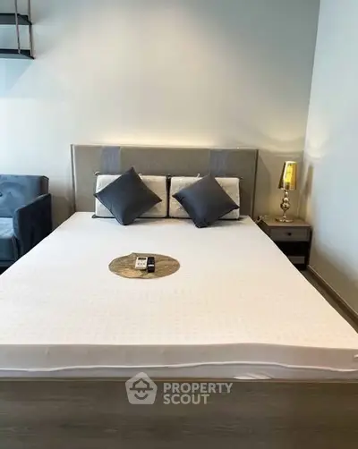 Modern bedroom with stylish decor and cozy ambiance