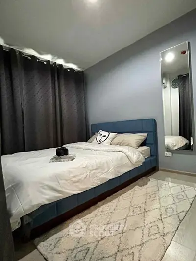 Cozy modern bedroom with stylish decor and plush bedding