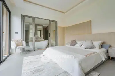 Luxurious bedroom with ensuite bathroom and modern decor
