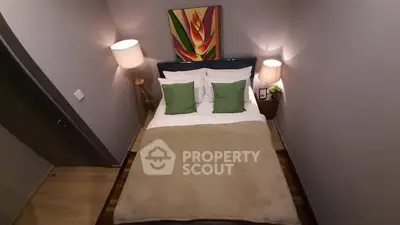 Cozy bedroom with modern decor and stylish lighting