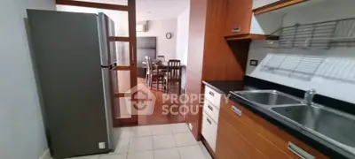 Modern kitchen with sleek cabinetry and stainless steel appliances