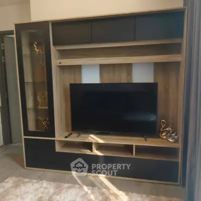 Modern living room with stylish TV unit and elegant decor