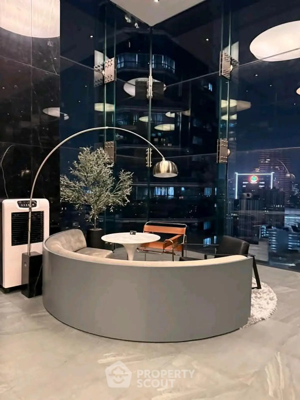 Luxurious modern living room with panoramic city view and stylish furniture