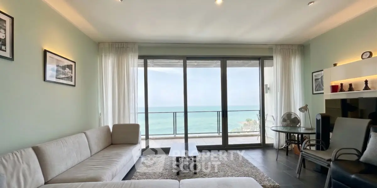 Spacious living room with stunning ocean view and modern decor