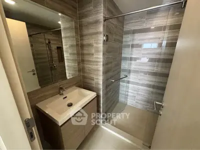 Modern bathroom with sleek design and glass shower enclosure