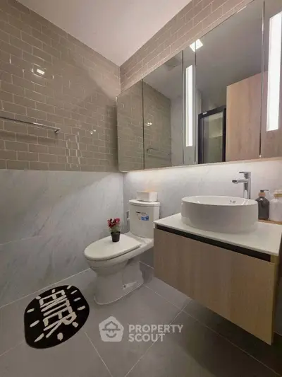 Modern bathroom with sleek fixtures and stylish tile design