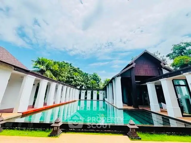 Luxurious villa with stunning pool and tropical garden view