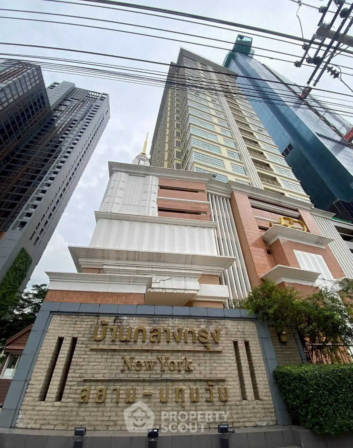 Stunning high-rise building with modern architectural design in urban setting.