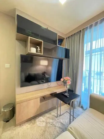 Modern living room with sleek TV unit and cozy decor