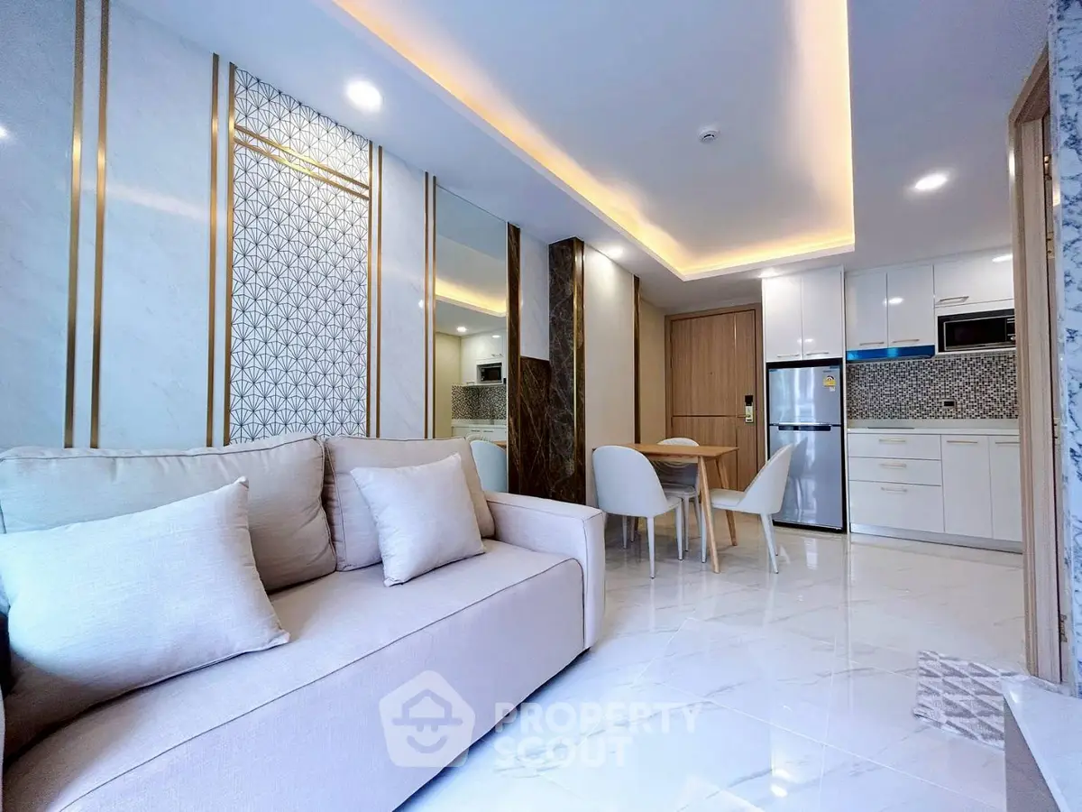 Luxurious modern living room with elegant decor and open kitchen layout