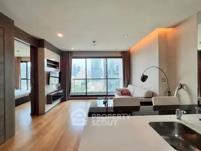 Modern living room with city view, open layout, and stylish decor.