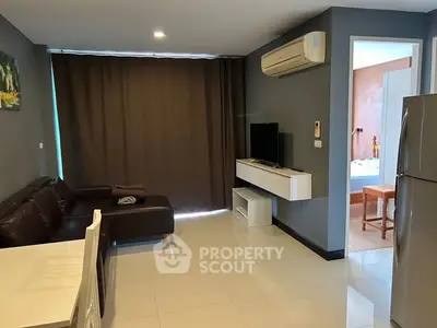 Modern living room with sleek furniture and air conditioning