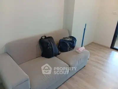 Cozy living room with modern sofa and wooden flooring