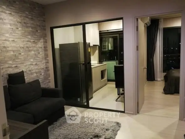 Modern apartment interior with cozy living room and sleek kitchen