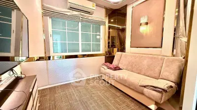 Cozy living room with modern decor and comfortable sofa