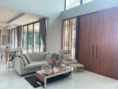 Luxurious modern living room with high ceilings and elegant decor