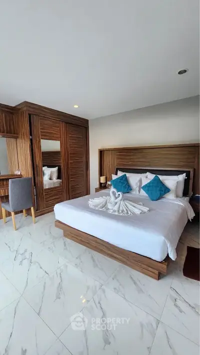 Luxurious bedroom with elegant wooden furniture and stylish decor