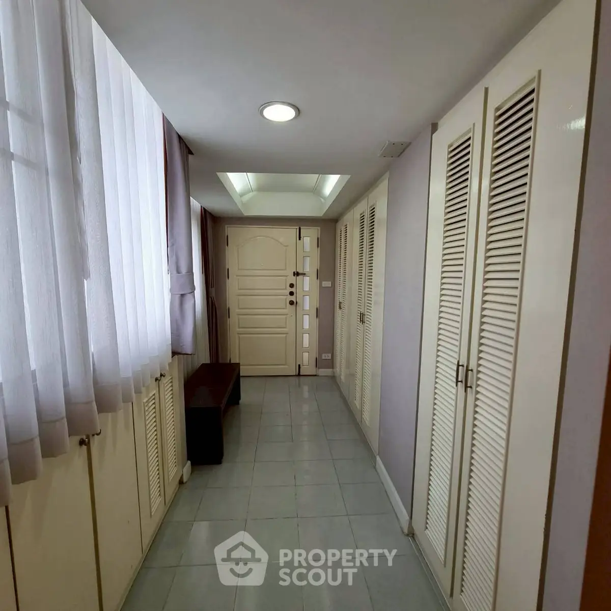 Spacious hallway with modern design and ample natural light